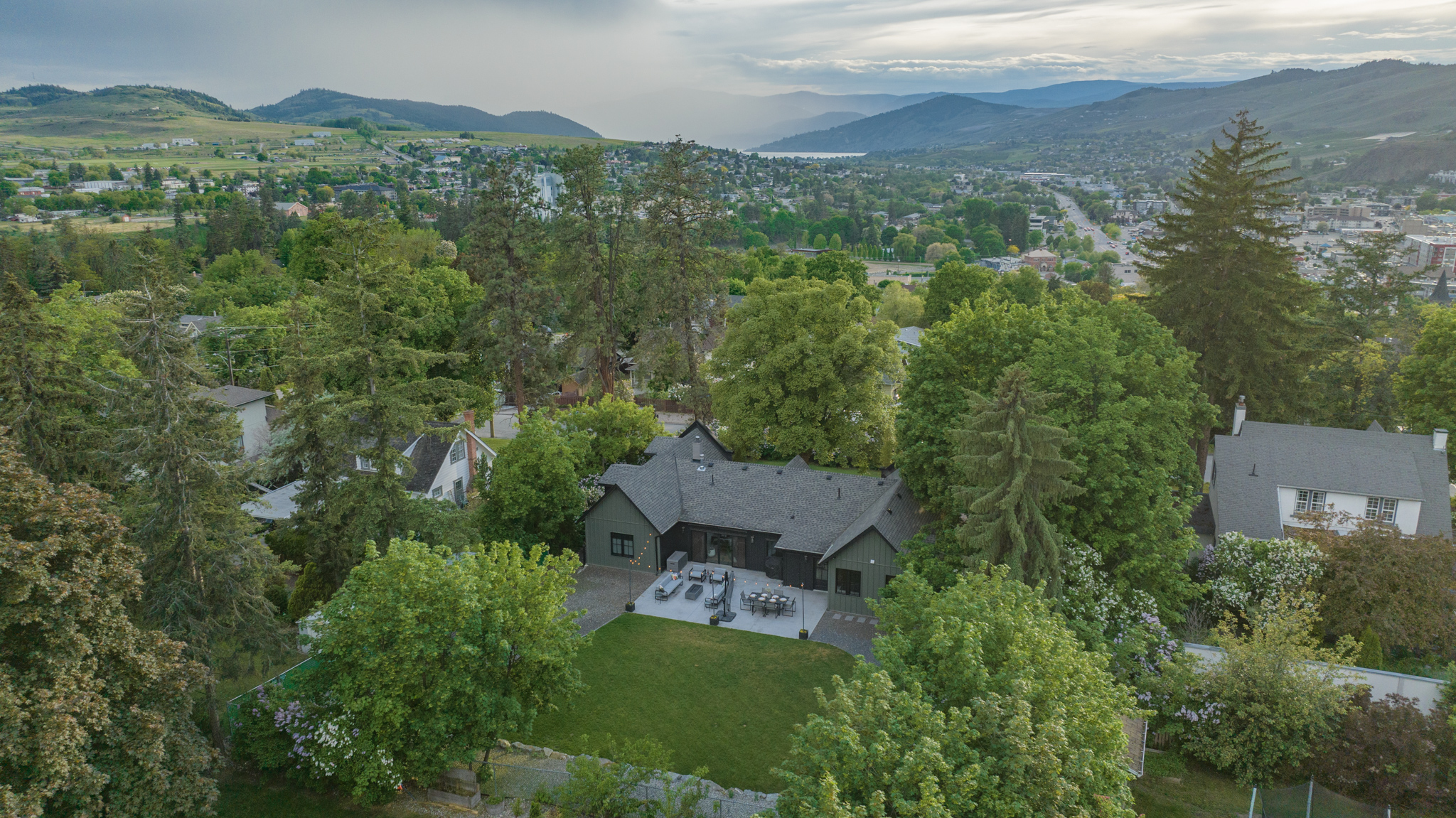 Aerial view showing generous lot in East Hill and valley backdrop